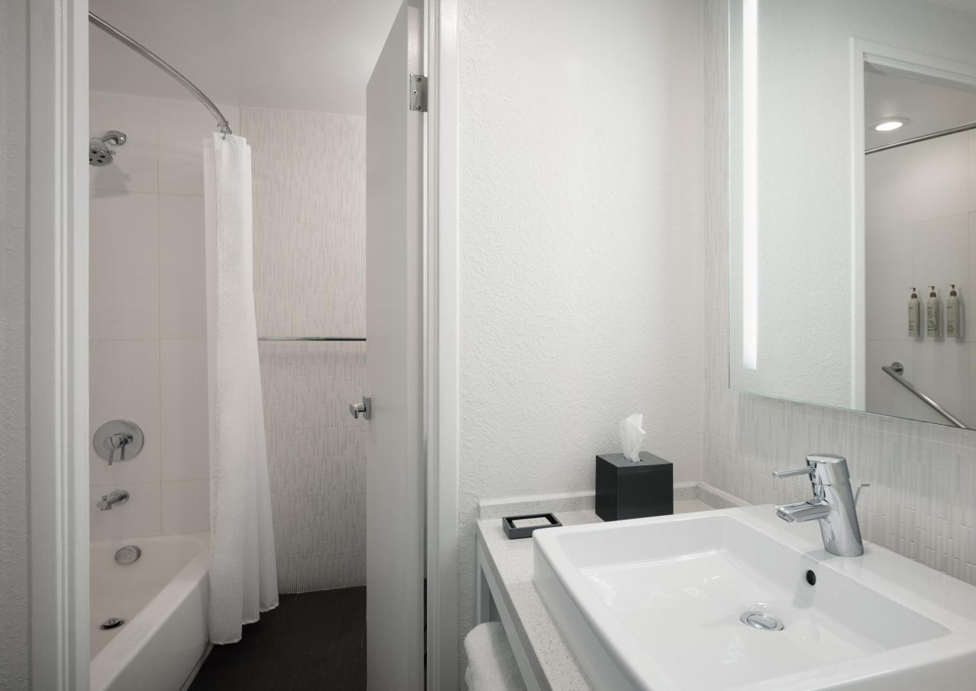 TOWER Two Queen Beds Sleeper Chair Roll Shower